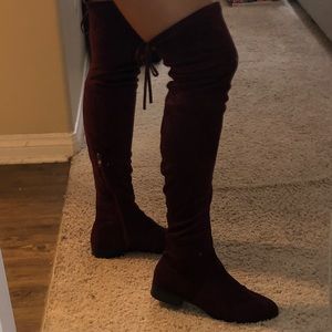 Tall maroon suede boots